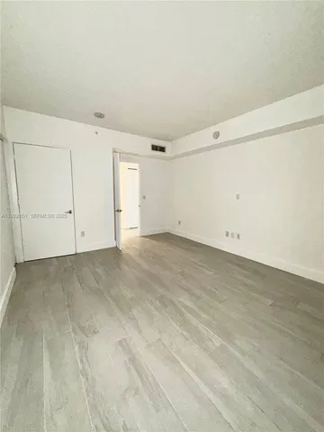 an empty room with window