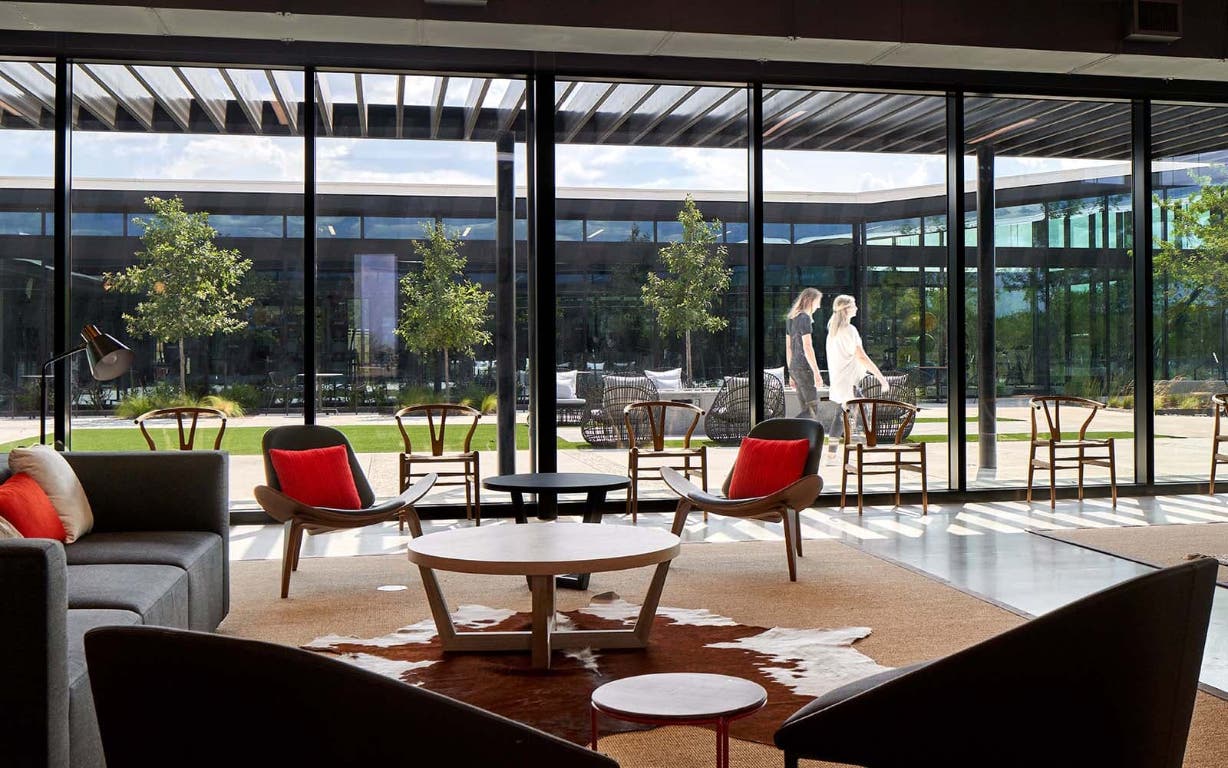 8104 Springsteen Drive Austin, TX 78744 - Photo 13 of 15 a dining room with glass top table and chairs