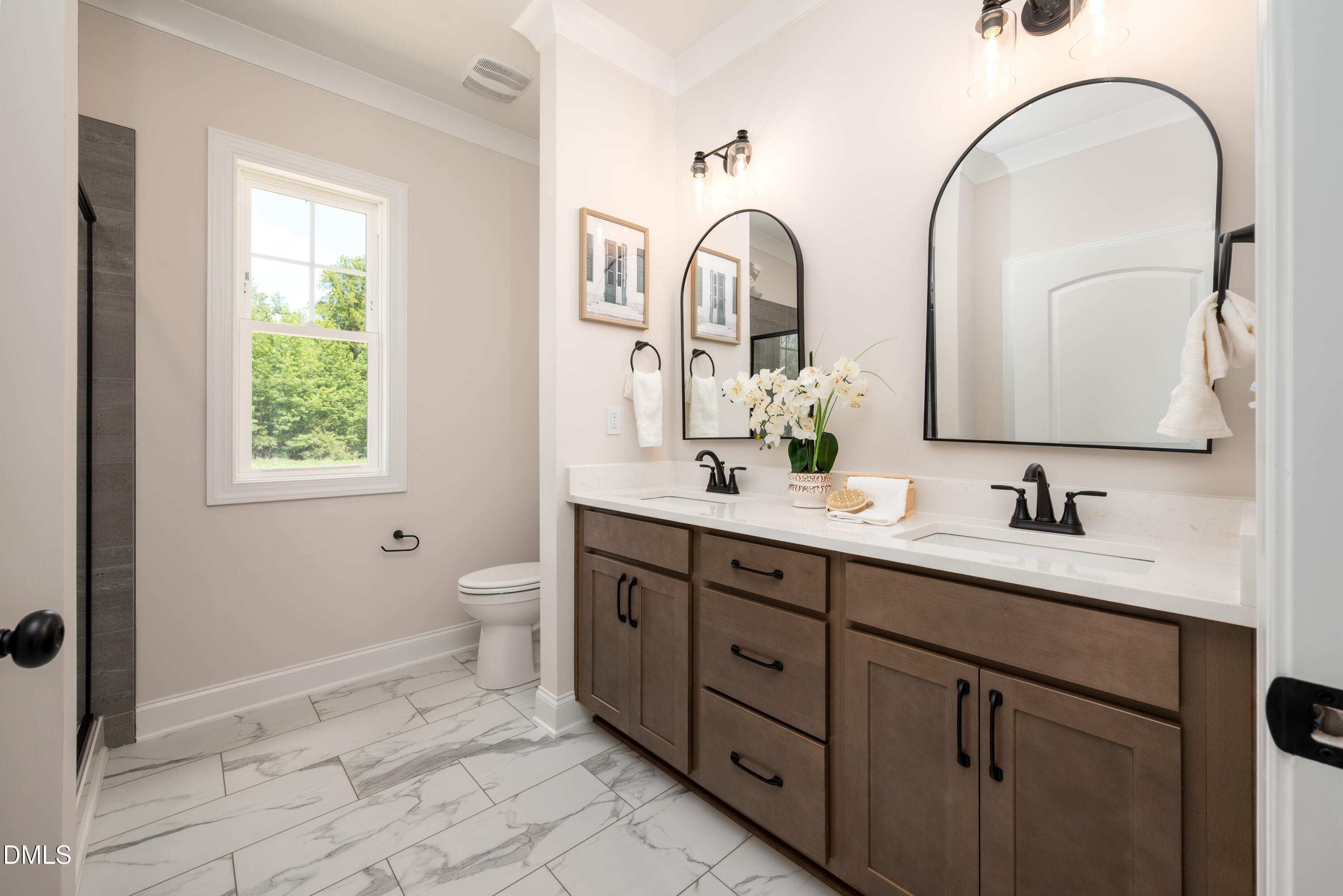 2275 Peachtree Hills Road Spring Hope, NC 27882 - Photo 5 of 43 a bathroom with a double vanity sink and a mirror