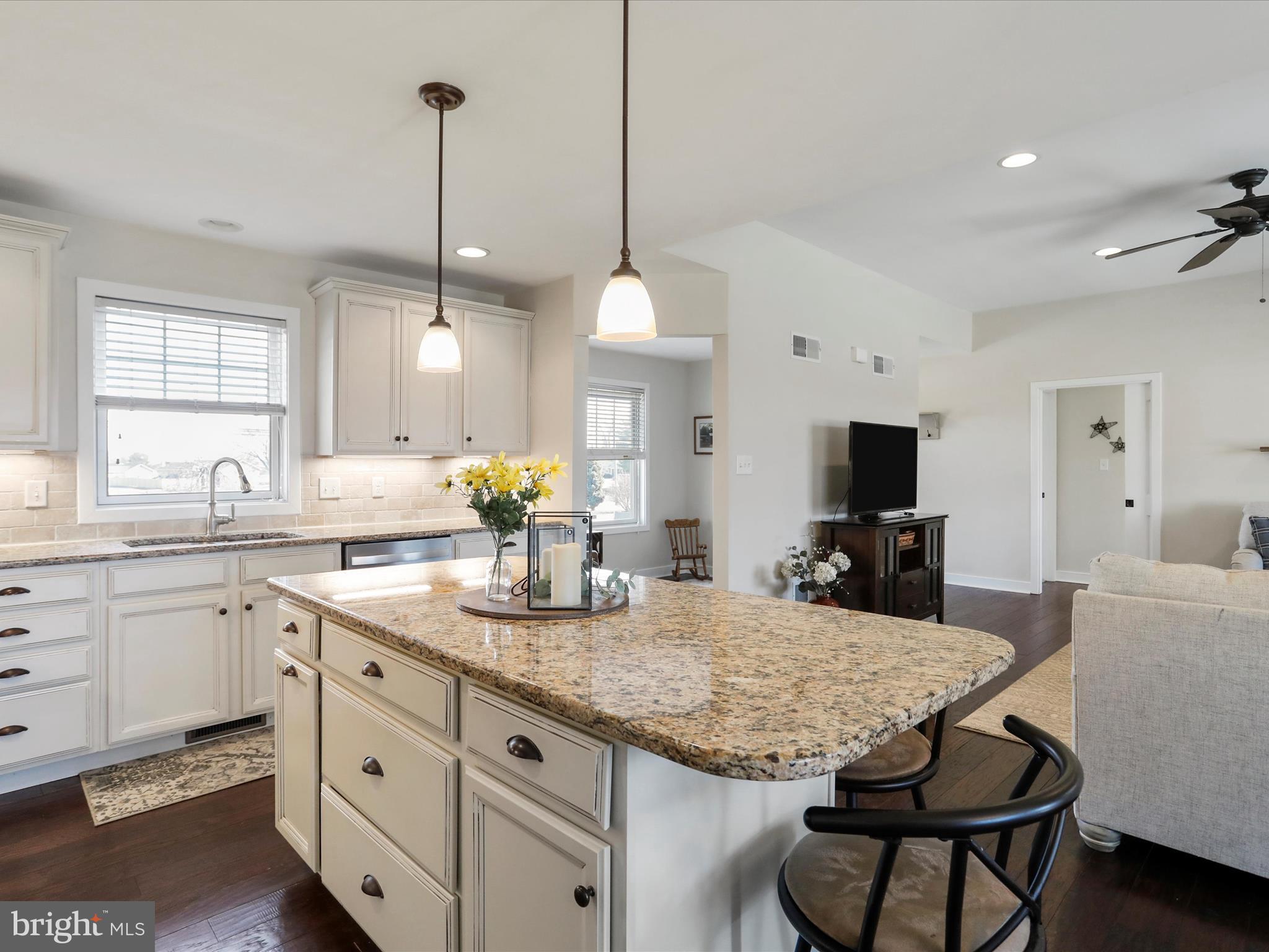 659 Warm Spring Road Chambersburg, PA 17202 - Photo 8 of 36 a kitchen with granite countertop kitchen island and stainless steel appliances