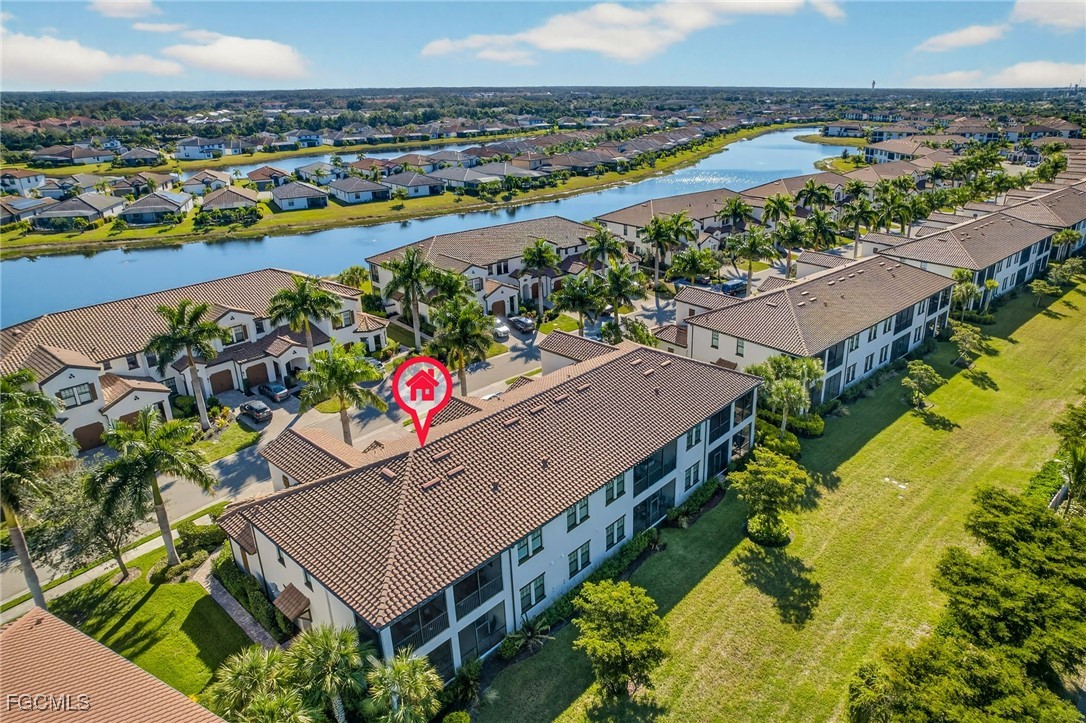11768 Grand Belvedere Way, Unit 203 Fort Myers, FL 33913 - Photo 30 of 47 an aerial view of a house with a outdoor space