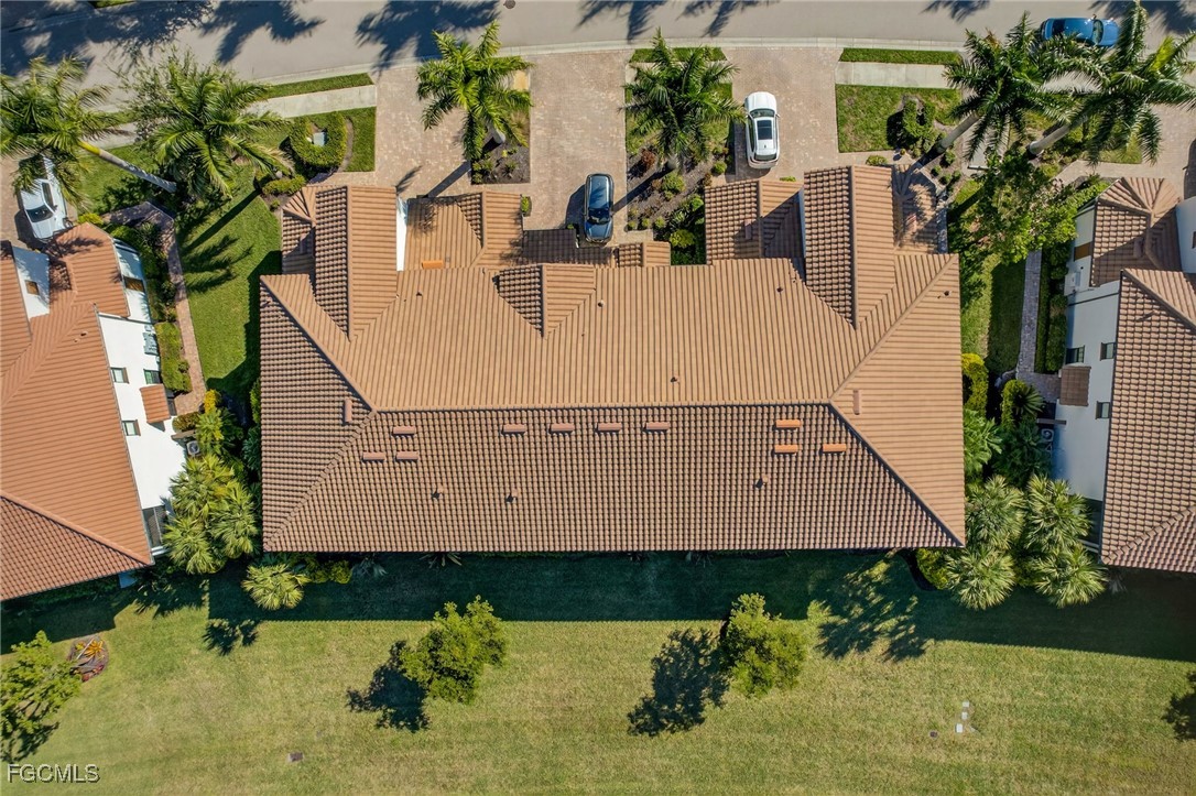 11768 Grand Belvedere Way, Unit 203 Fort Myers, FL 33913 - Photo 31 of 47 an aerial view of a house with swimming pool