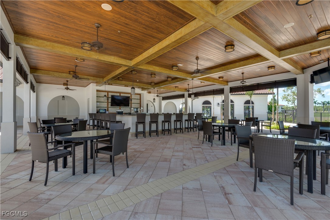 11768 Grand Belvedere Way, Unit 203 Fort Myers, FL 33913 - Photo 39 of 47 a view of a bar restaurant