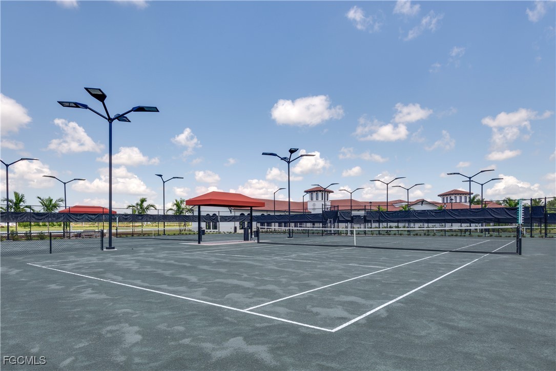 11768 Grand Belvedere Way, Unit 203 Fort Myers, FL 33913 - Photo 43 of 47 a outdoor space with lots of tables and chairs