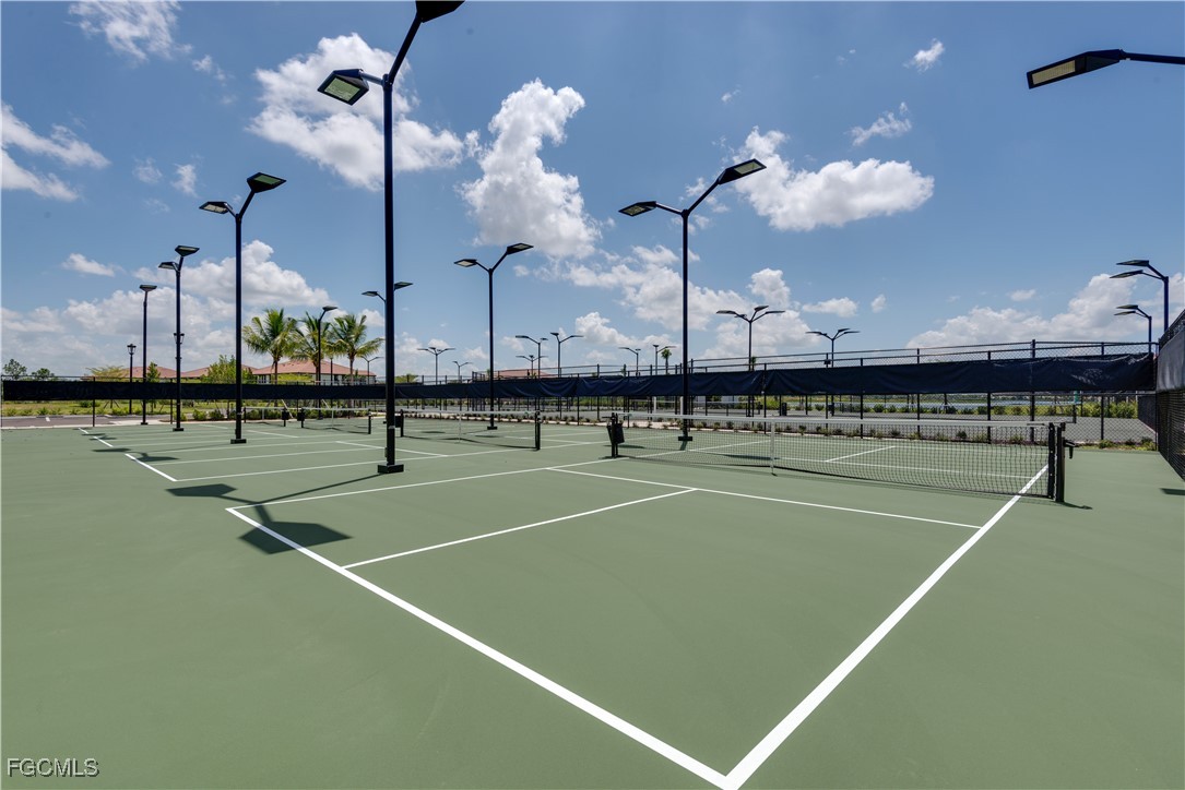 11768 Grand Belvedere Way, Unit 203 Fort Myers, FL 33913 - Photo 44 of 47 a view of a tennis court