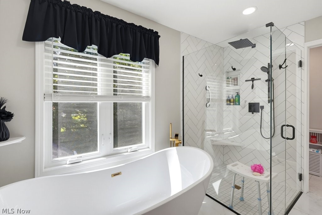 851 Susan Road Ravenna, OH 44266 - Photo 31 of 50 Freestanding soaking tub with gold-finish fixtures