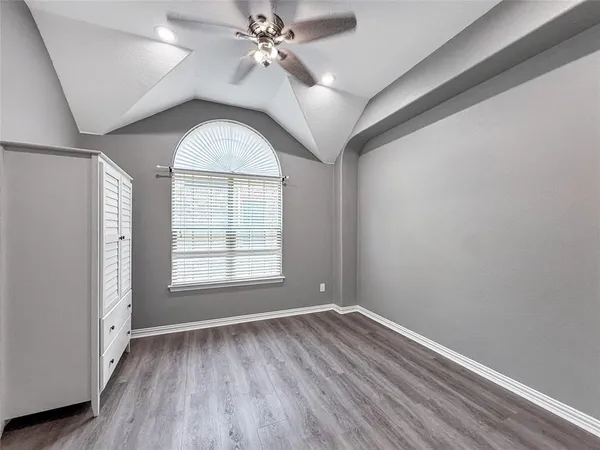 a front view of a house with stainless steel appliances and entryway