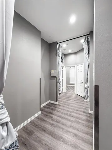 a bathroom with a sink a mirror and shower