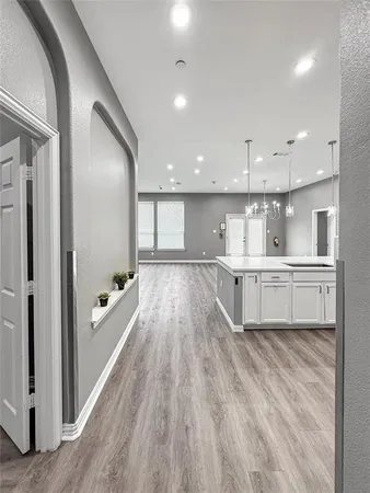 a view of backyard with wooden fence