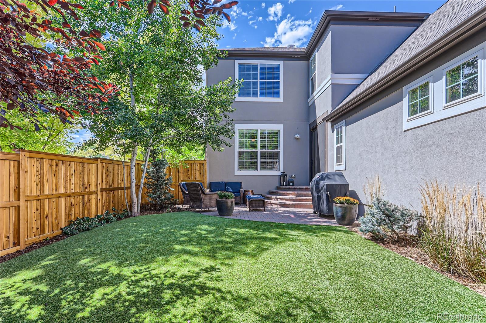 908 Syracuse Street Denver, CO 80230 - Photo 19 of 28 a view of outdoor space yard and patio