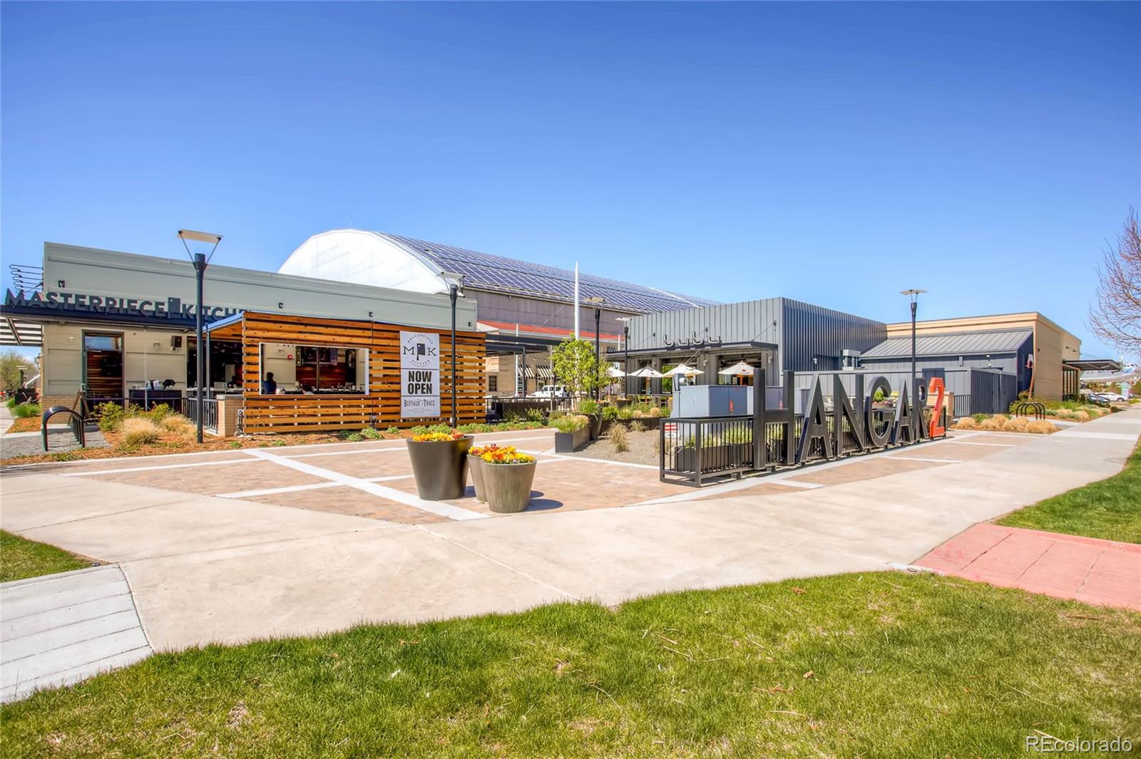 908 Syracuse Street Denver, CO 80230 - Photo 22 of 28 a view of a swimming pool with a patio