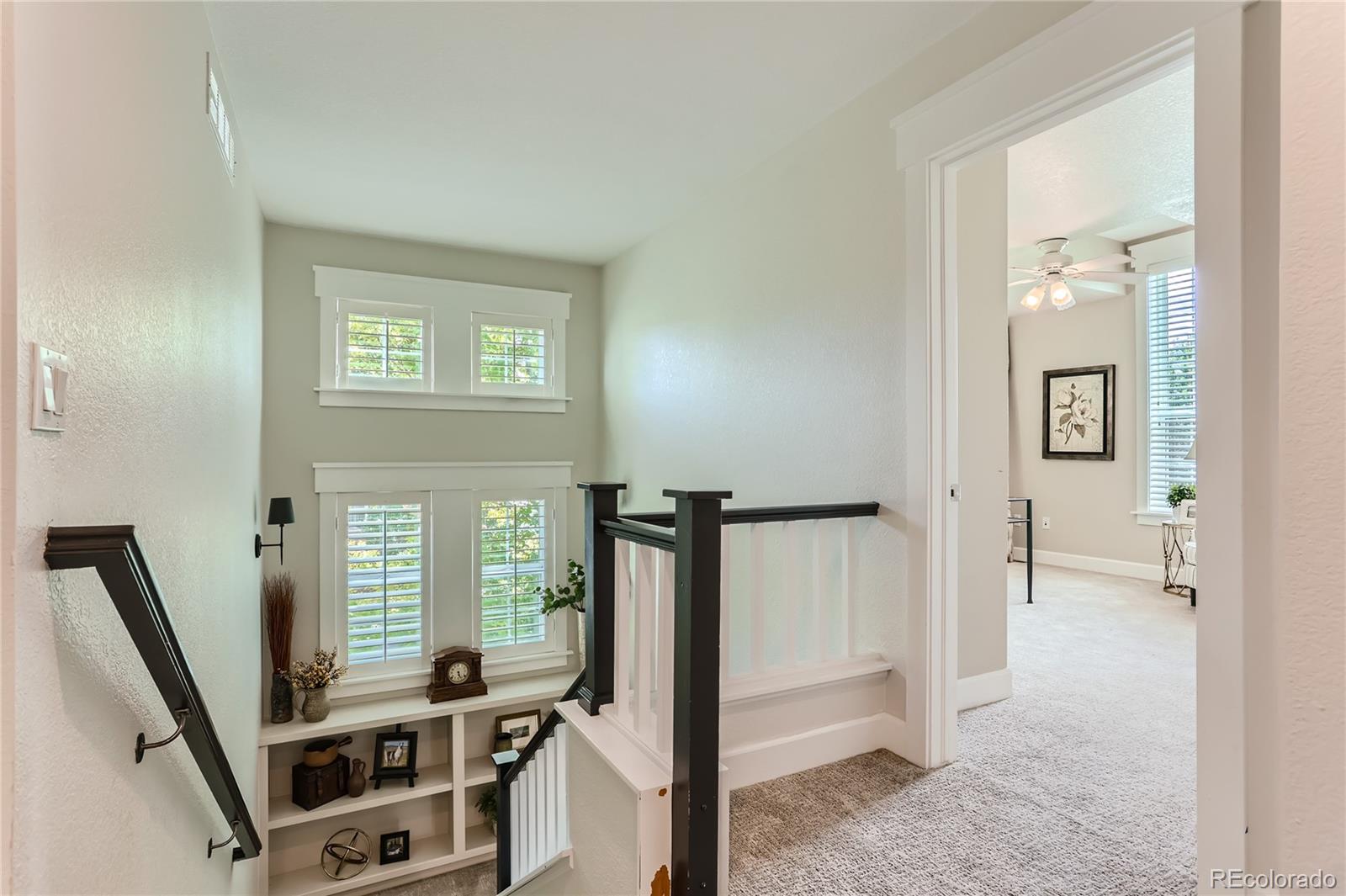 908 Syracuse Street Denver, CO 80230 - Photo 9 of 28 a view of a livingroom with furniture and windows