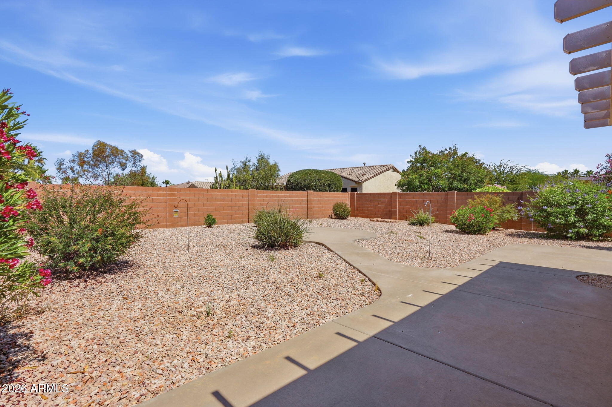 19113 North Hunters Run Surprise, AZ 85387 - Photo 20 of 45 a view of a road with a big yard