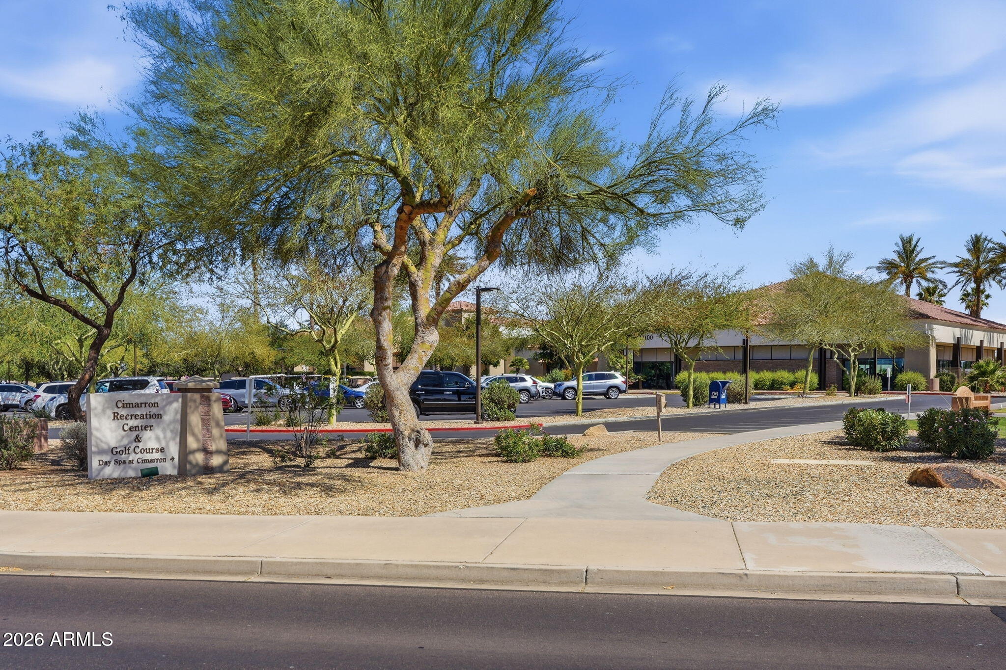 19113 North Hunters Run Surprise, AZ 85387 - Photo 22 of 45 a view of a yard and car parked