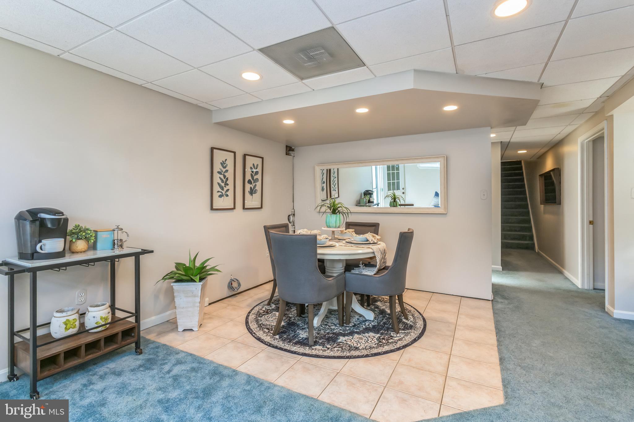 9458 Damascus Road Damascus, MD 20872 - Photo 26 of 30 This space is perfect for a kitchen or game table