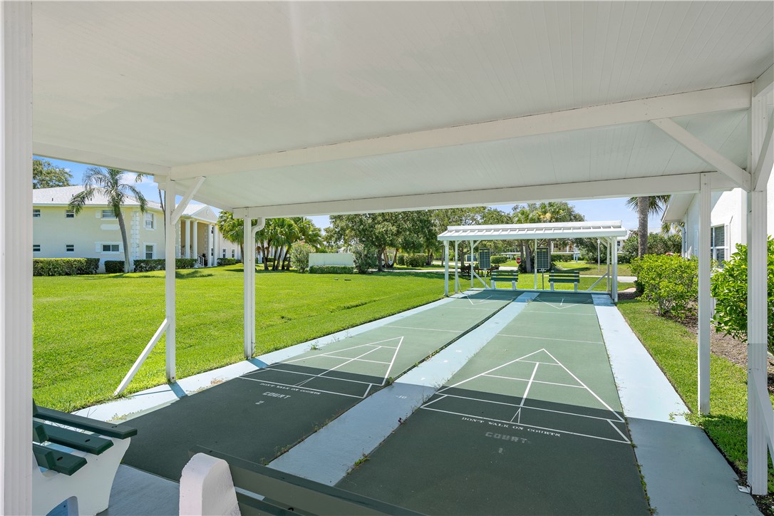 475 Grove Isle Circle, Unit 475 Vero Beach, FL 32962 - Photo 28 of 36 a view of yard with swimming pool