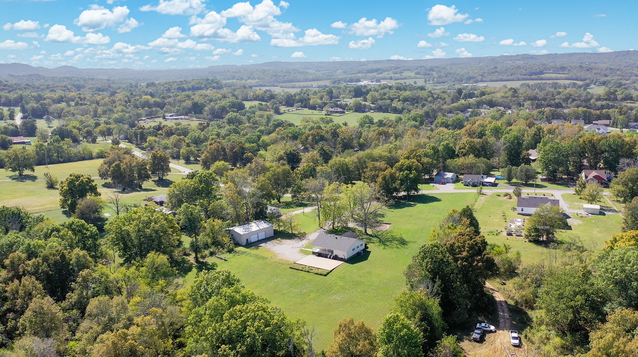 1235 Yell Road Lewisburg, TN 37091 - Photo 15 of 36 an aerial view of residential houses with outdoor space and trees