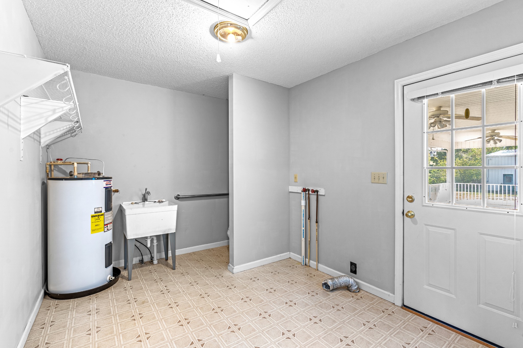 1235 Yell Road Lewisburg, TN 37091 - Photo 31 of 36 a view of a storage & utility room with a window