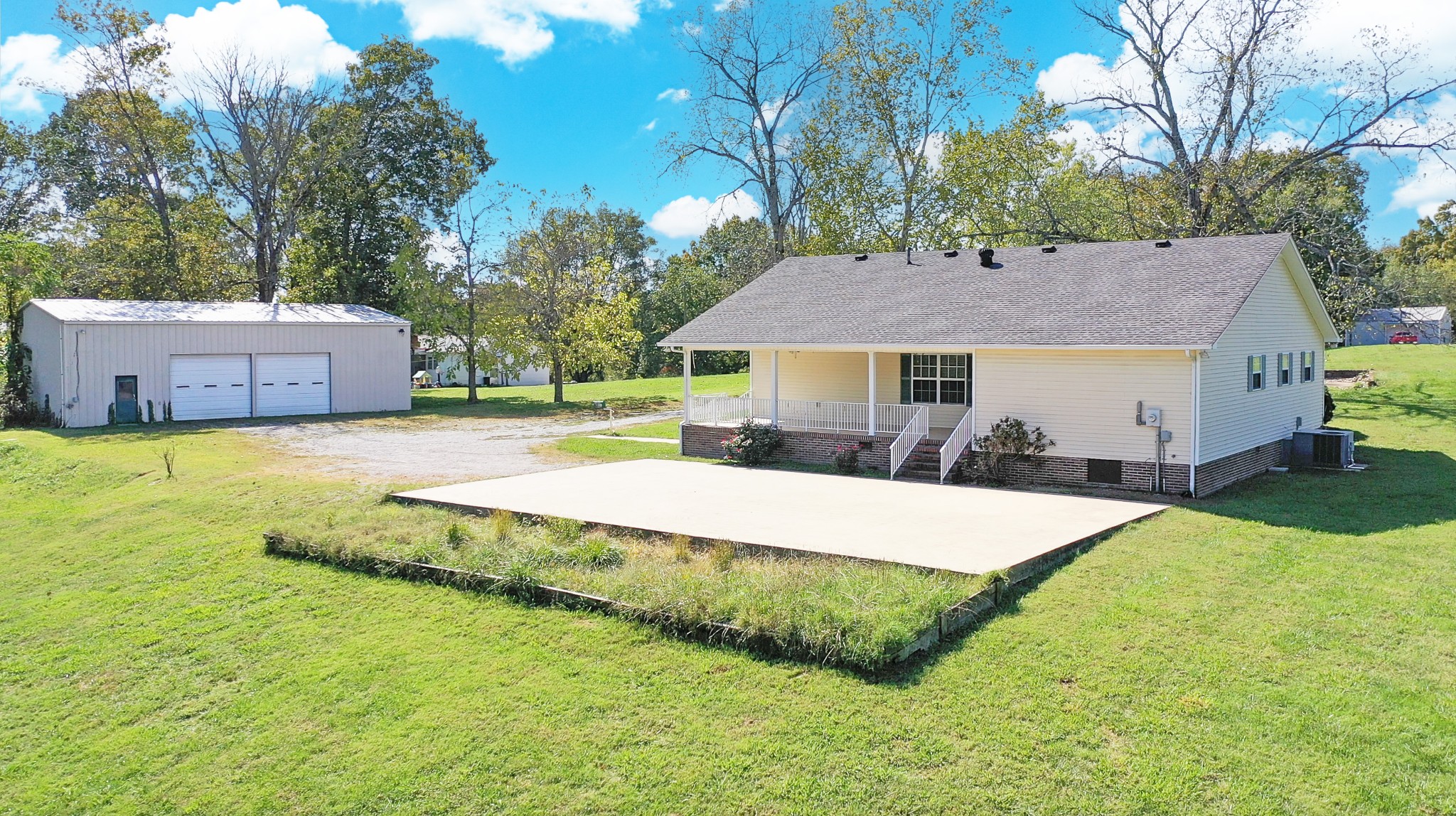 1235 Yell Road Lewisburg, TN 37091 - Photo 8 of 36 a aerial view of a house with swimming pool and a yard