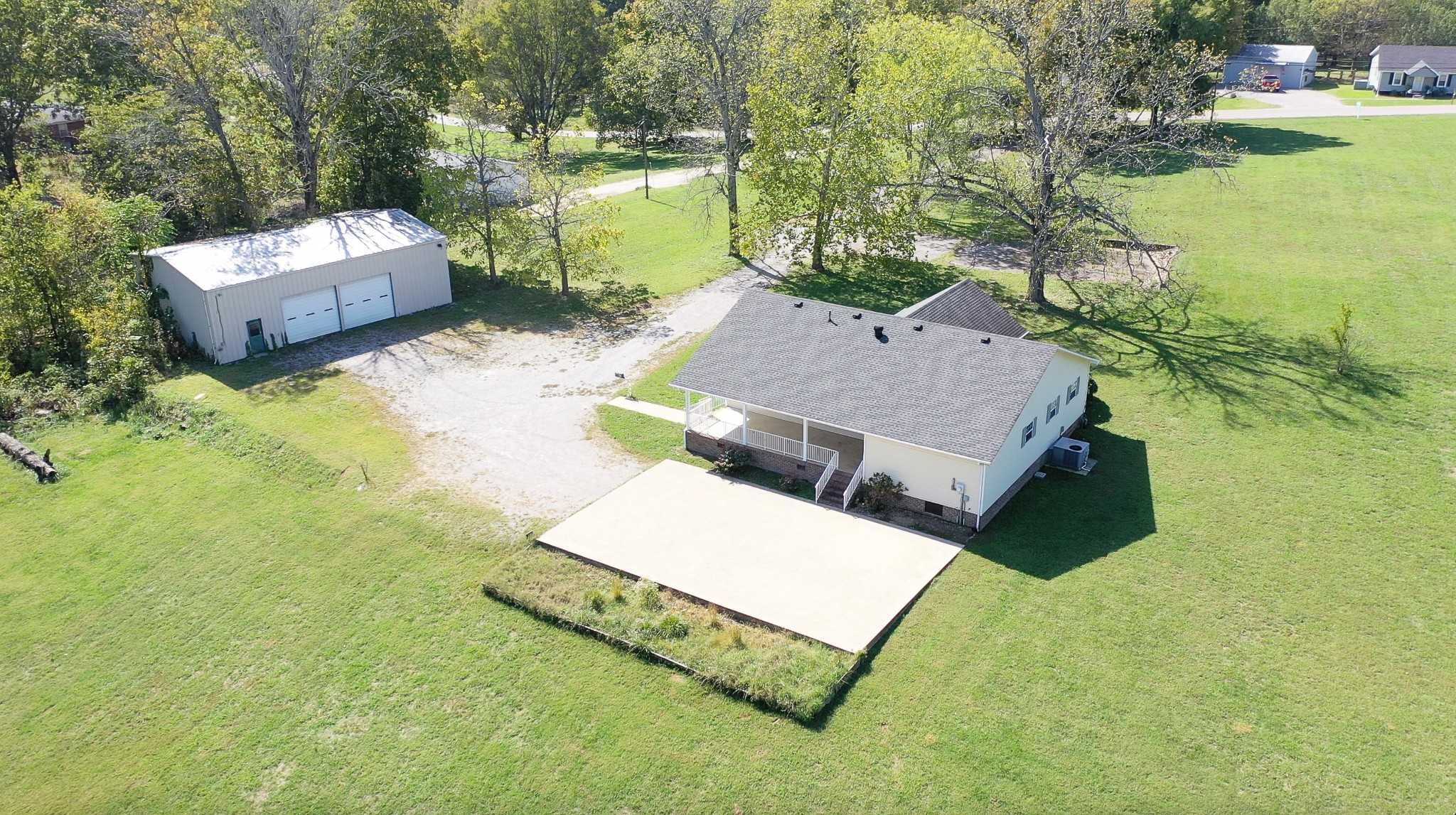 1235 Yell Road Lewisburg, TN 37091 - Photo 9 of 36 a view of a house with a yard and sitting area