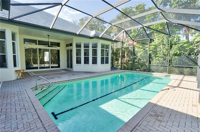 a view of a house with a swimming pool
