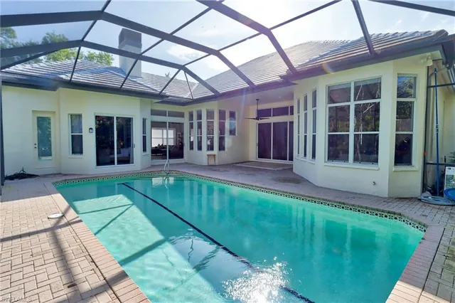 a view of a room with a backyard