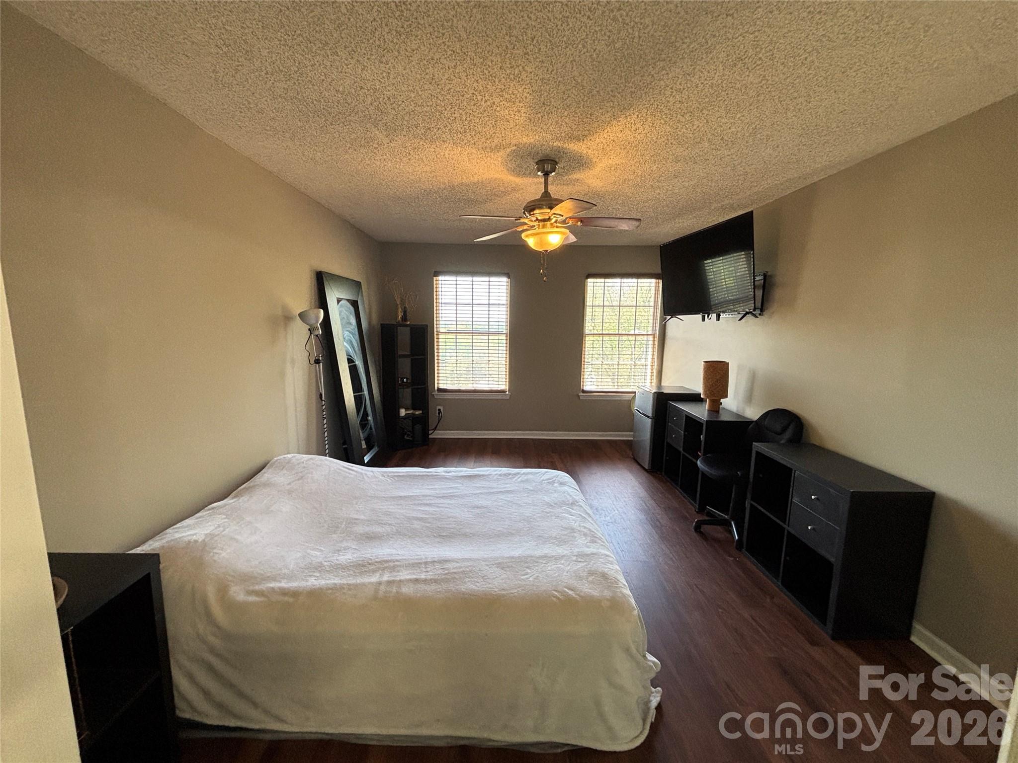 2601 Yarrow Road Charlotte, NC 28213 - Photo 21 of 40 a view of a livingroom with furniture windows and wooden floor