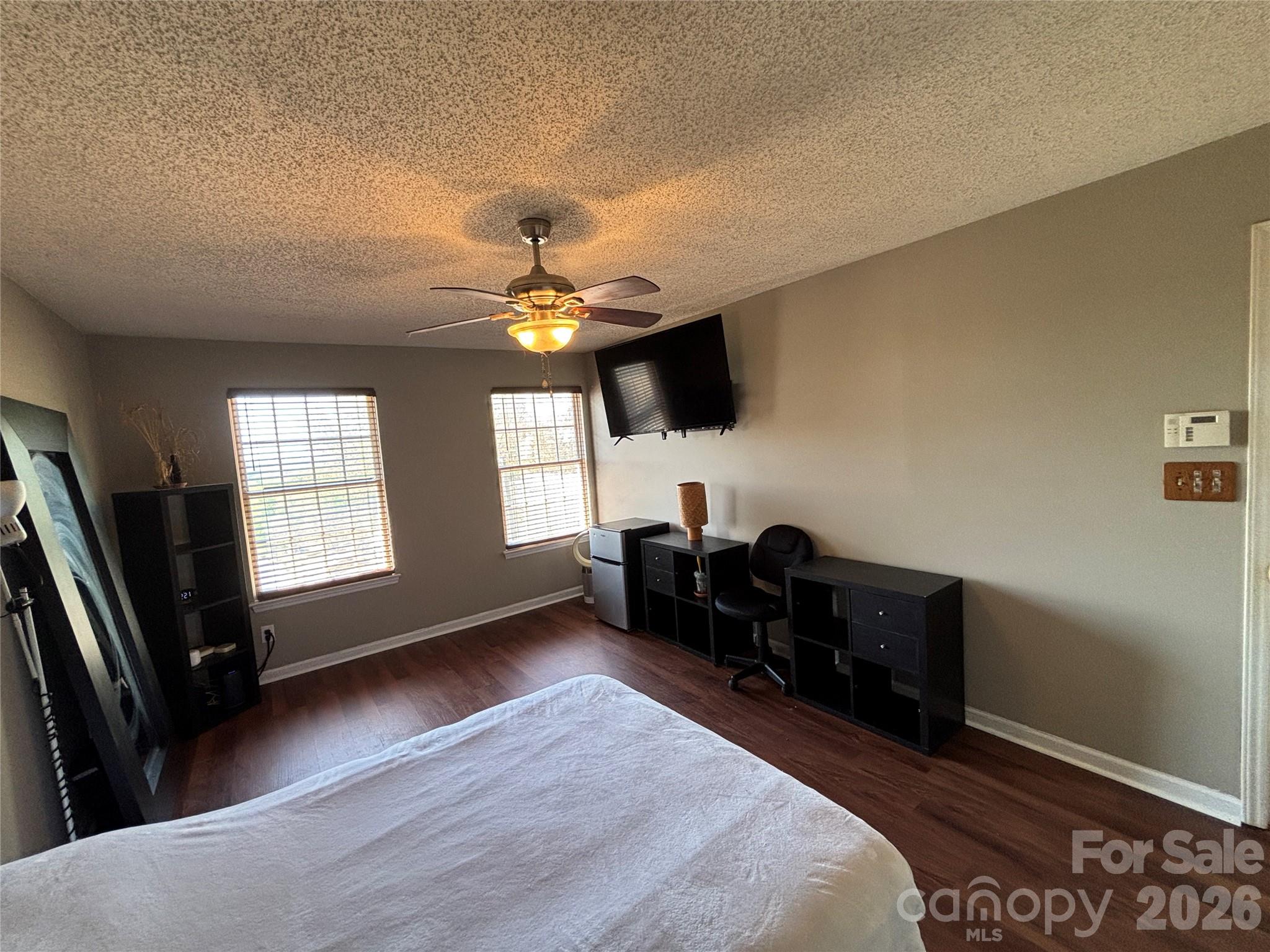 2601 Yarrow Road Charlotte, NC 28213 - Photo 23 of 40 a living room with furniture and a flat screen tv