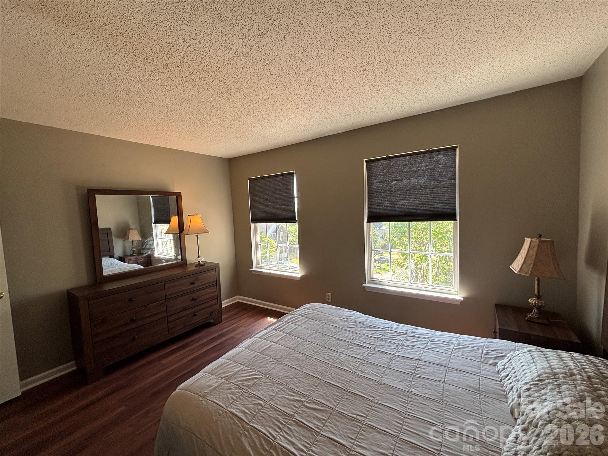 2601 Yarrow Road Charlotte, NC 28213 - Photo 30 of 40 a bedroom with a bed and window