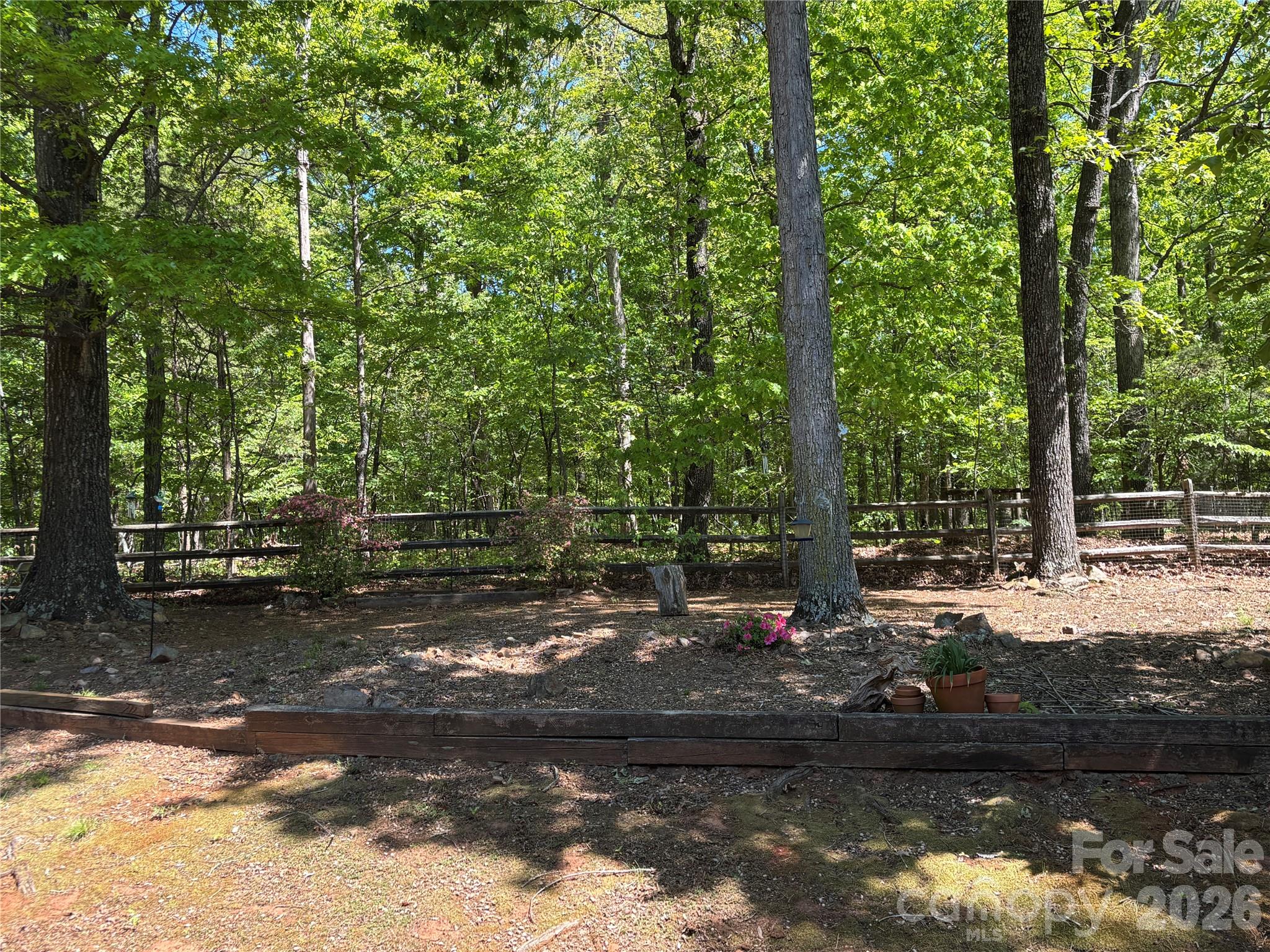 2601 Yarrow Road Charlotte, NC 28213 - Photo 40 of 40 a view of a yard with wooden fence