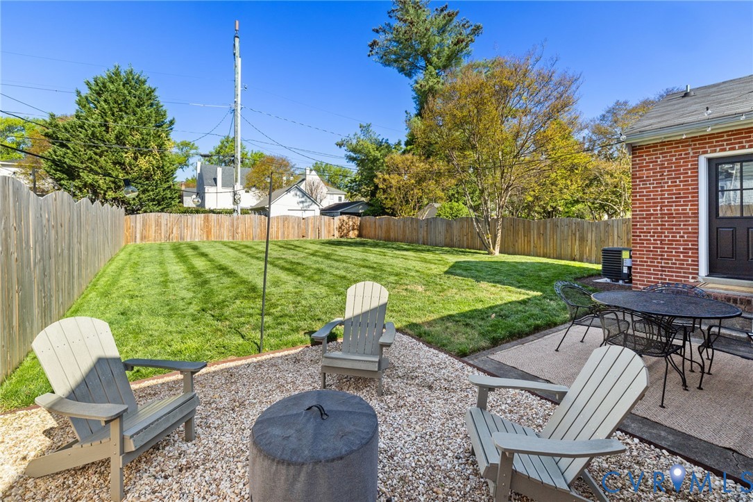 336 Lexington Road Richmond, VA 23226 - Photo 17 of 20 a view of a backyard with furniture and a garden