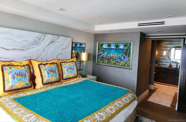 a bedroom with furniture and window