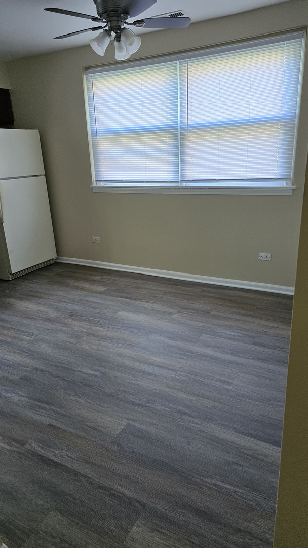 4052 Charleston Road, Unit 2E Matteson, IL 60443 - Photo 3 of 5 a view of a room with a sink