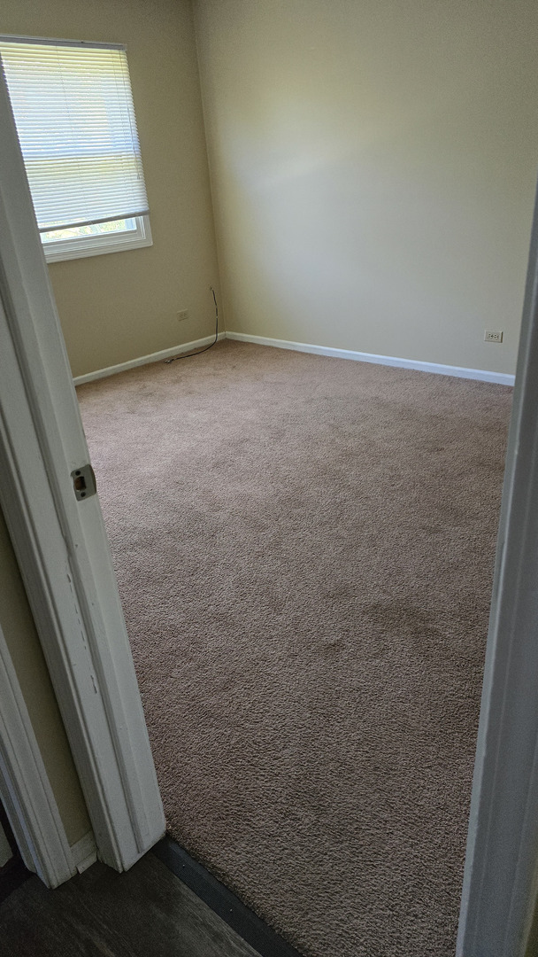 4052 Charleston Road, Unit 2E Matteson, IL 60443 - Photo 5 of 5 a view of room with window