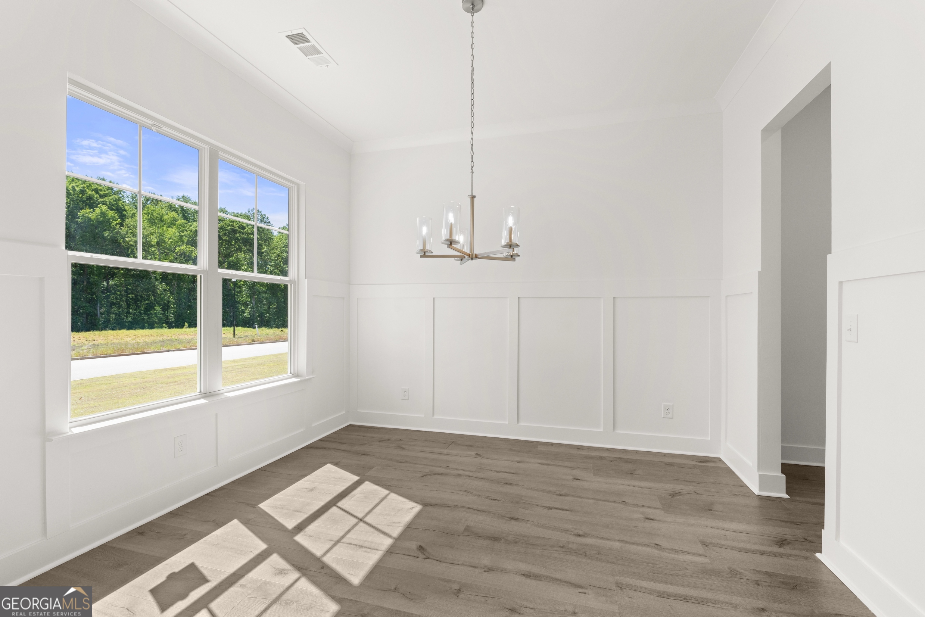 15 Overview Court Hoschton, GA 30548 - Photo 9 of 43 a view of an empty room with a window