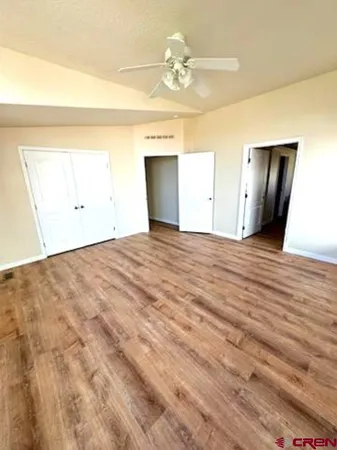 a bathroom with a granite countertop sink and a bathtub