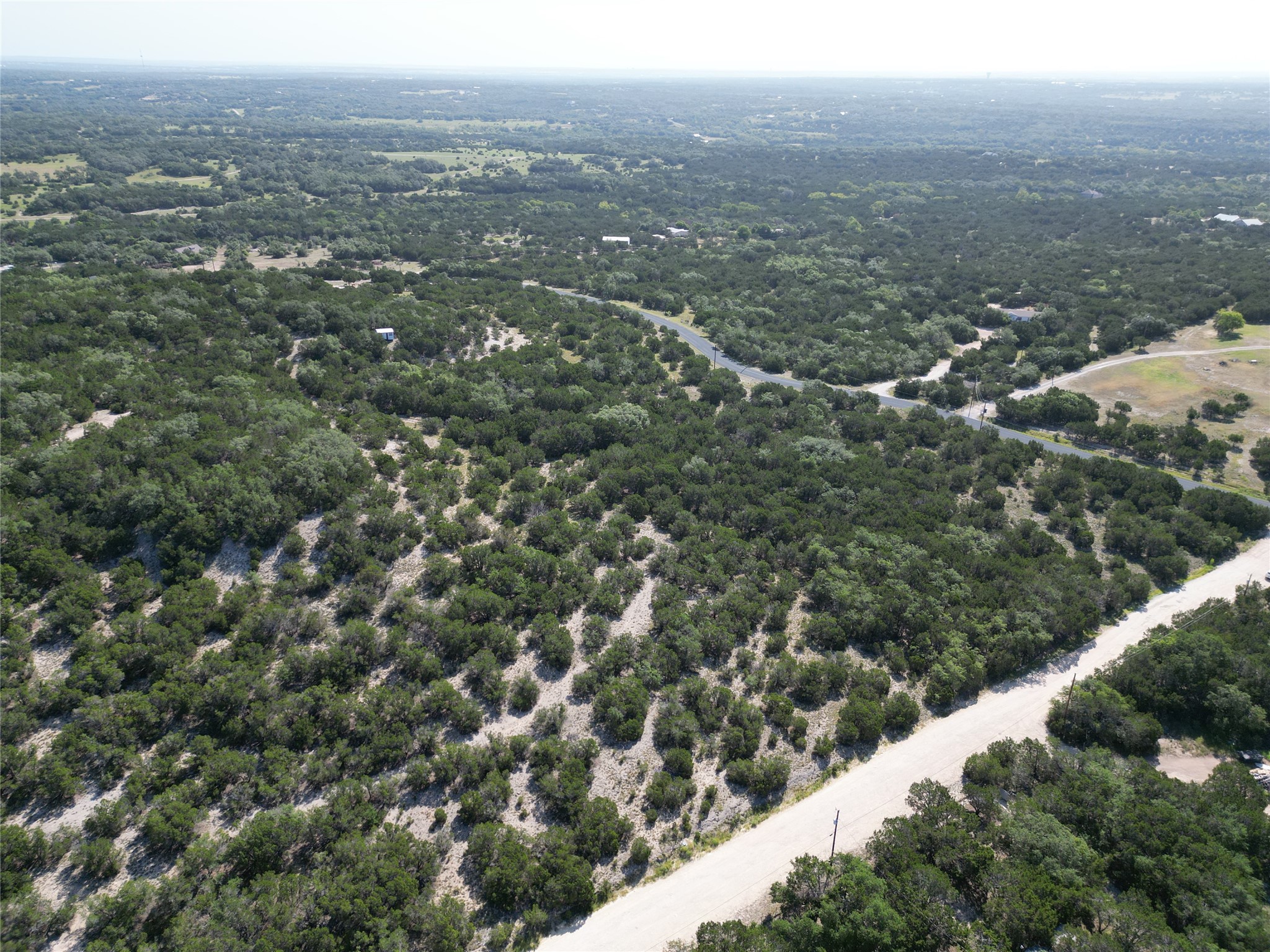Lot 29 Anderson Trail Leander, TX 78641 - Photo 19 of 22 an aerial view of house with yard and mountain view in back