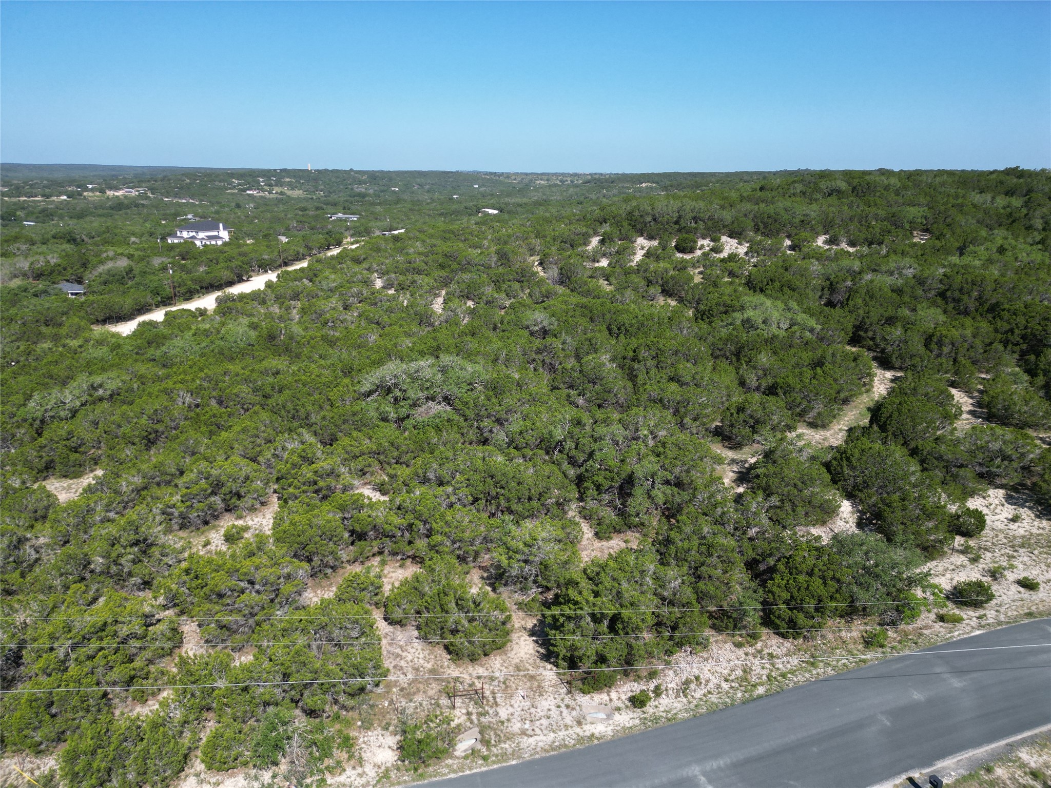 Lot 29 Anderson Trail Leander, TX 78641 - Photo 21 of 22 an aerial view of residential houses with outdoor space and trees
