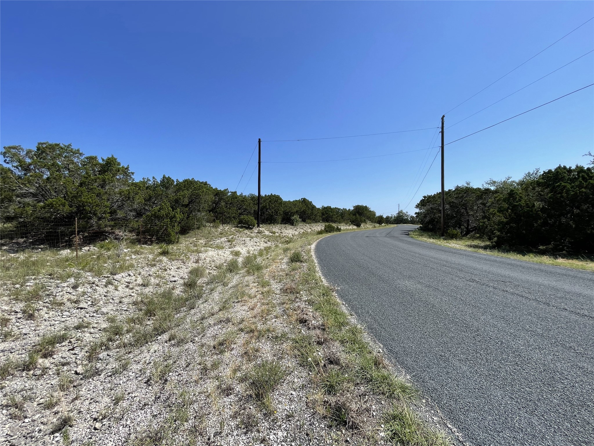 Lot 29 Anderson Trail Leander, TX 78641 - Photo 3 of 22 a view of a road with a yard