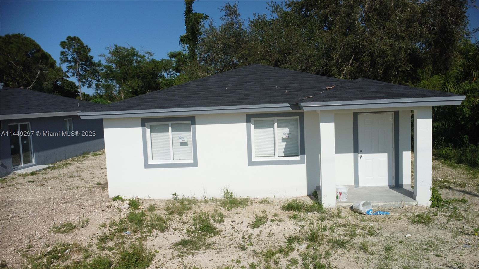 Miami-Dade County Miami, FL 33170 - Photo 2 of 23 a house with trees in front of it