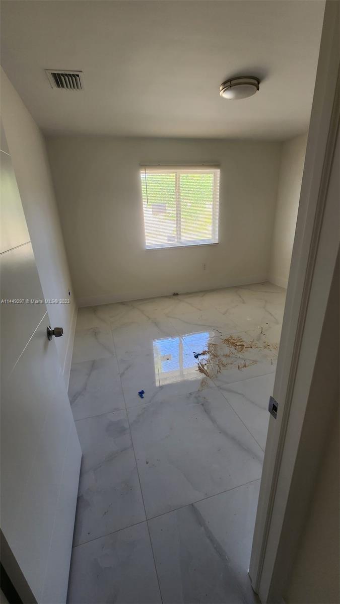 Miami-Dade County Miami, FL 33170 - Photo 21 of 23 a view of storage and utility room with window