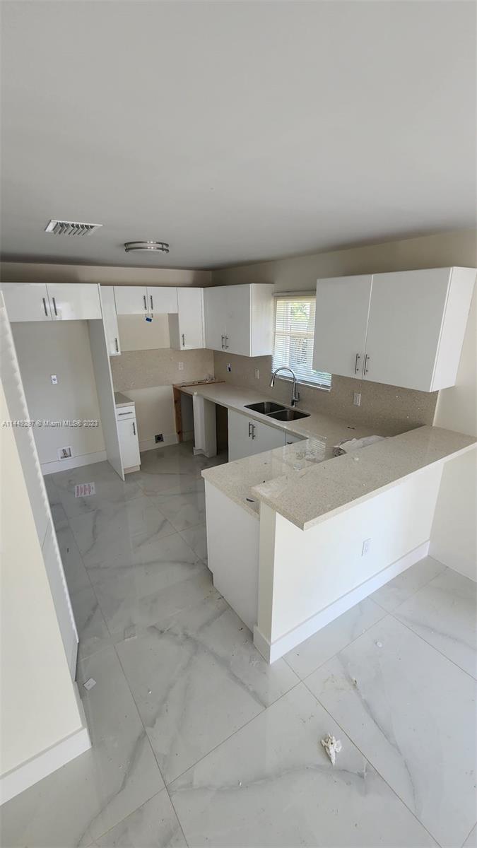 Miami-Dade County Miami, FL 33170 - Photo 23 of 23 a view of kitchen with refrigerator and window