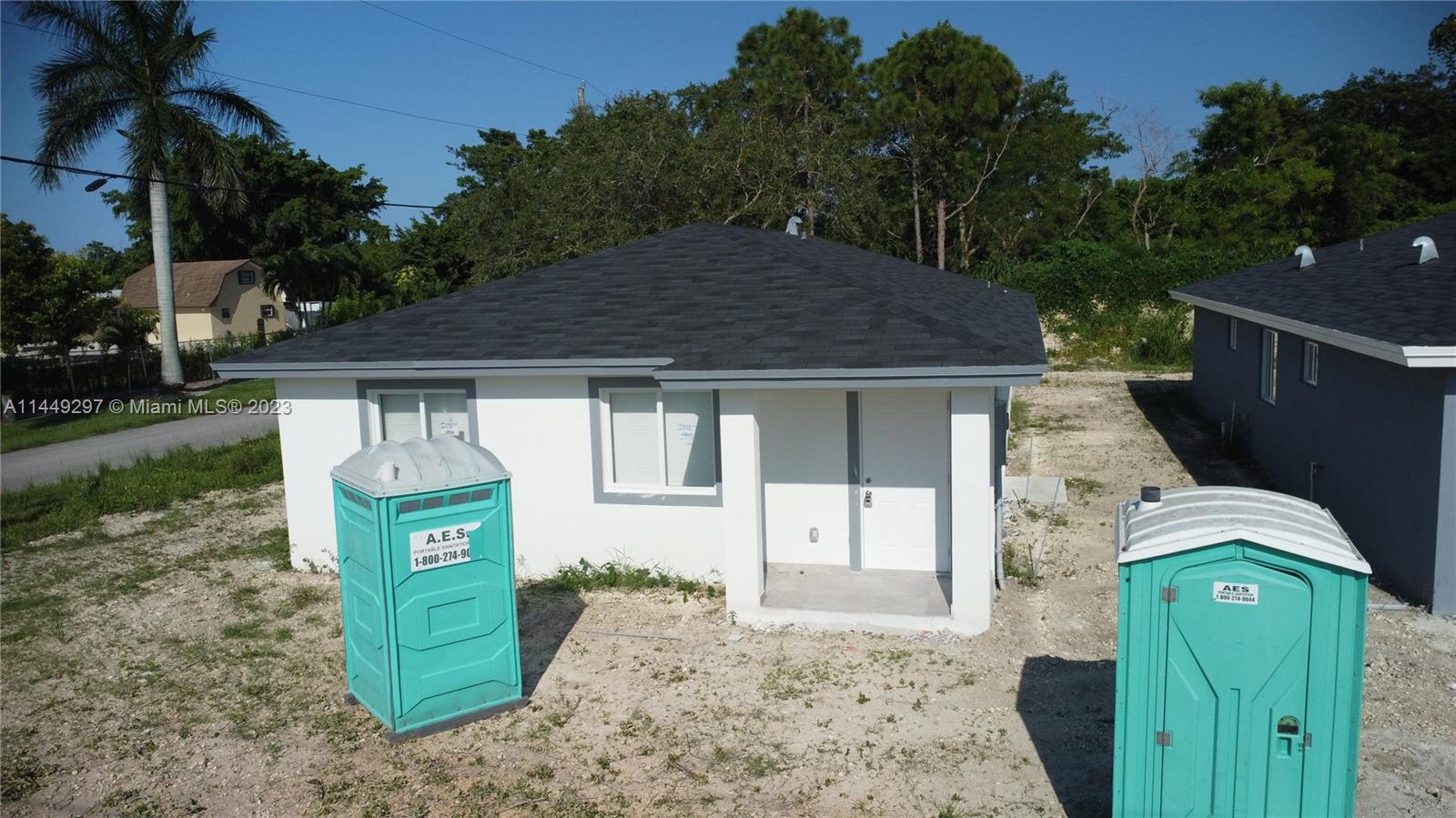 Miami-Dade County Miami, FL 33170 - Photo 3 of 23 a front view of a house with garden