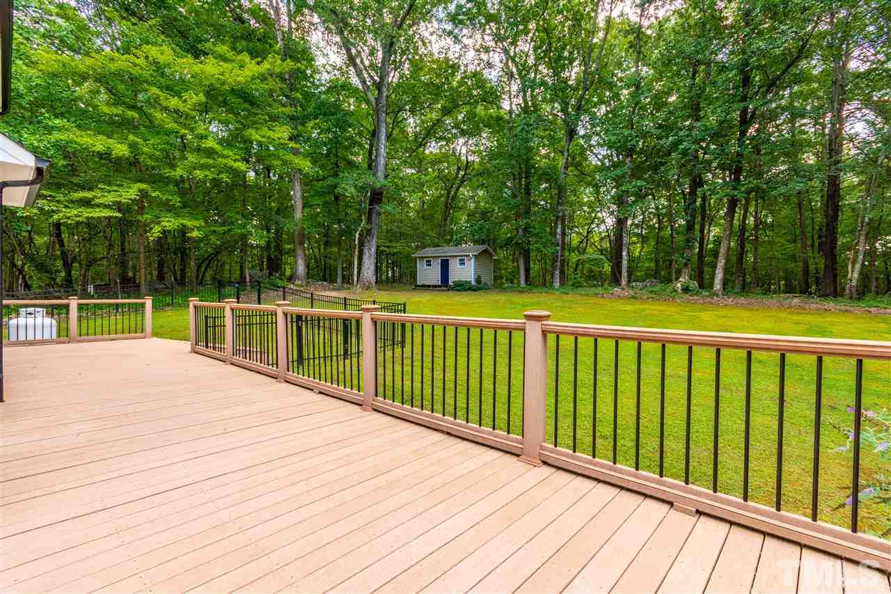 1022 Dove Ridge Road Bahama, NC 27503 - Photo 22 of 27 a view of a wooden deck