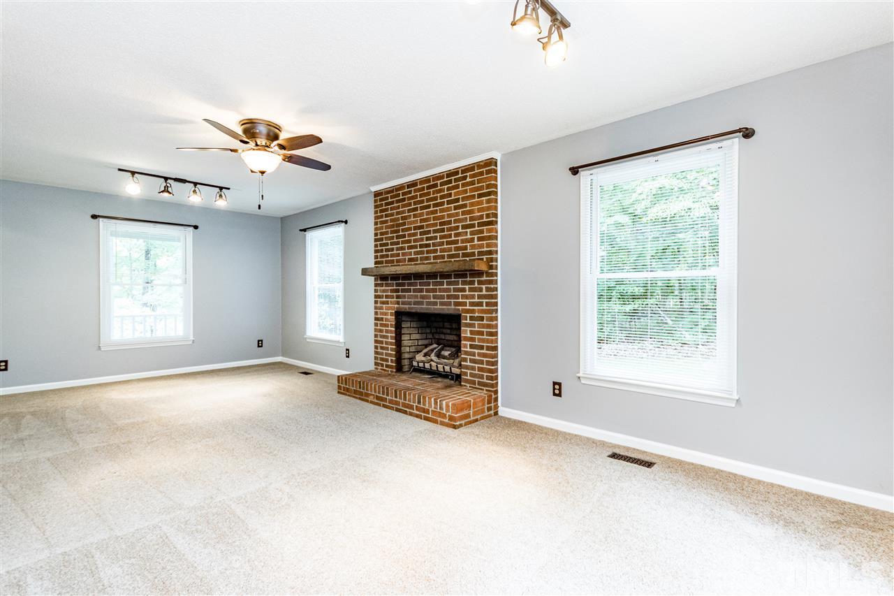 1022 Dove Ridge Road Bahama, NC 27503 - Photo 5 of 27 a view of an empty room with a window