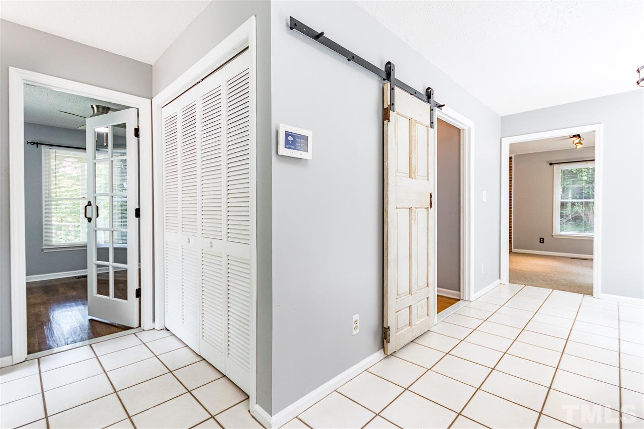 1022 Dove Ridge Road Bahama, NC 27503 - Photo 8 of 27 a view of a walk in closet and bedroom