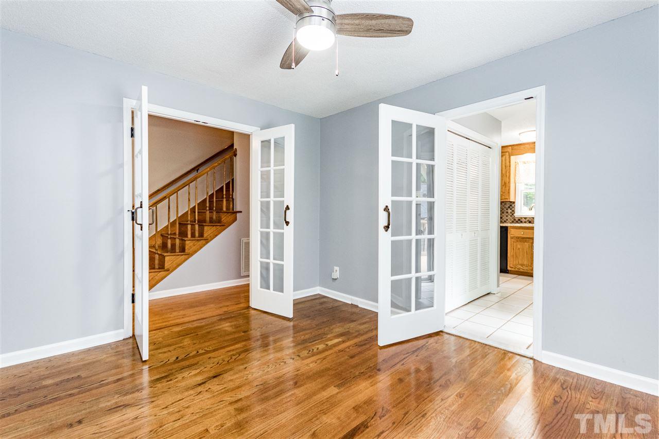 1022 Dove Ridge Road Bahama, NC 27503 - Photo 9 of 27 a view of livingroom with hardwood floor and ceiling fan