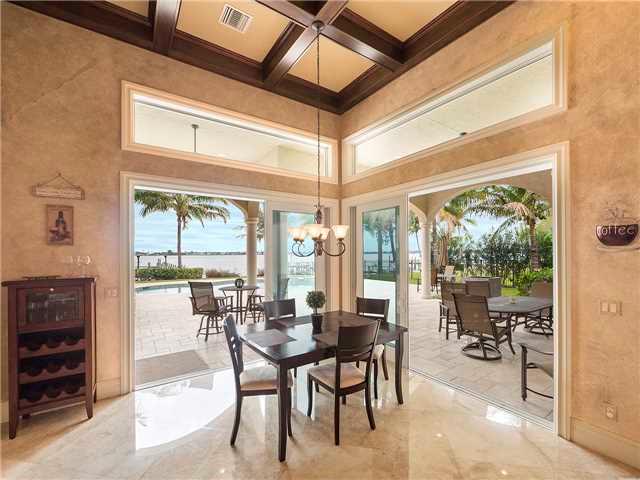 1410 Northwest Fork Road Stuart, FL 34994 - Photo 10 of 25 a view of a dining room with furniture window and outside view
