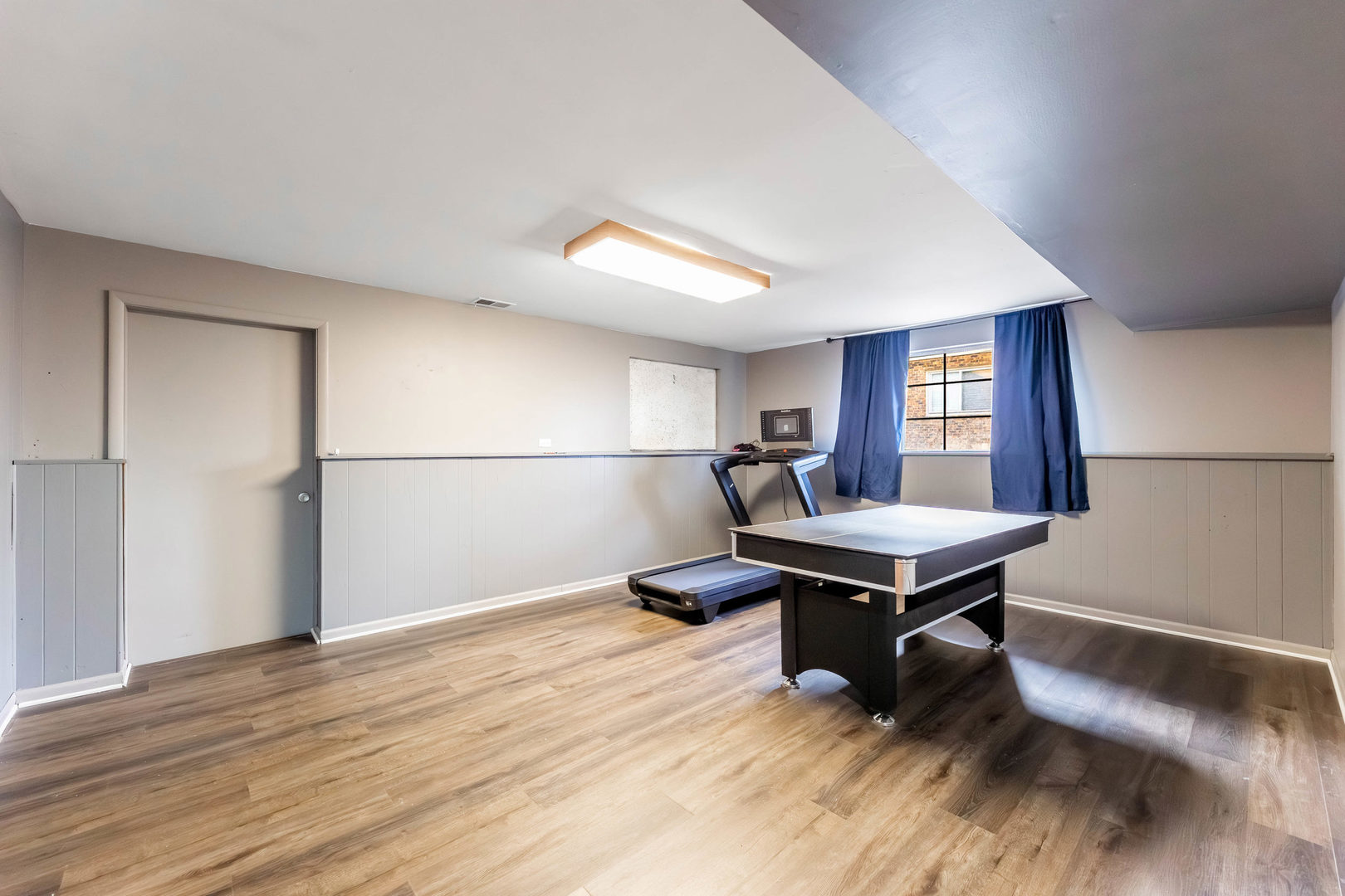 313 Jackson Street Park Forest, IL 60466 - Photo 13 of 22 a living room with a table chairs and wooden floor