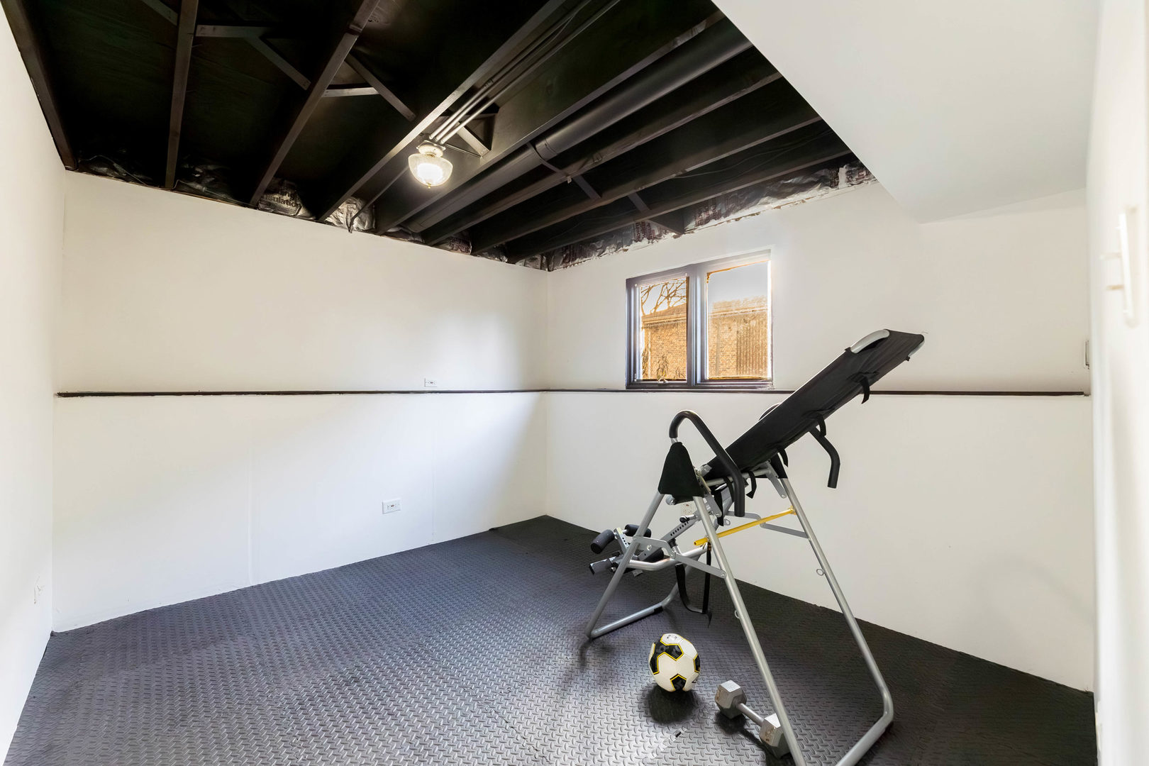 313 Jackson Street Park Forest, IL 60466 - Photo 15 of 22 a view of a room with gym equipment